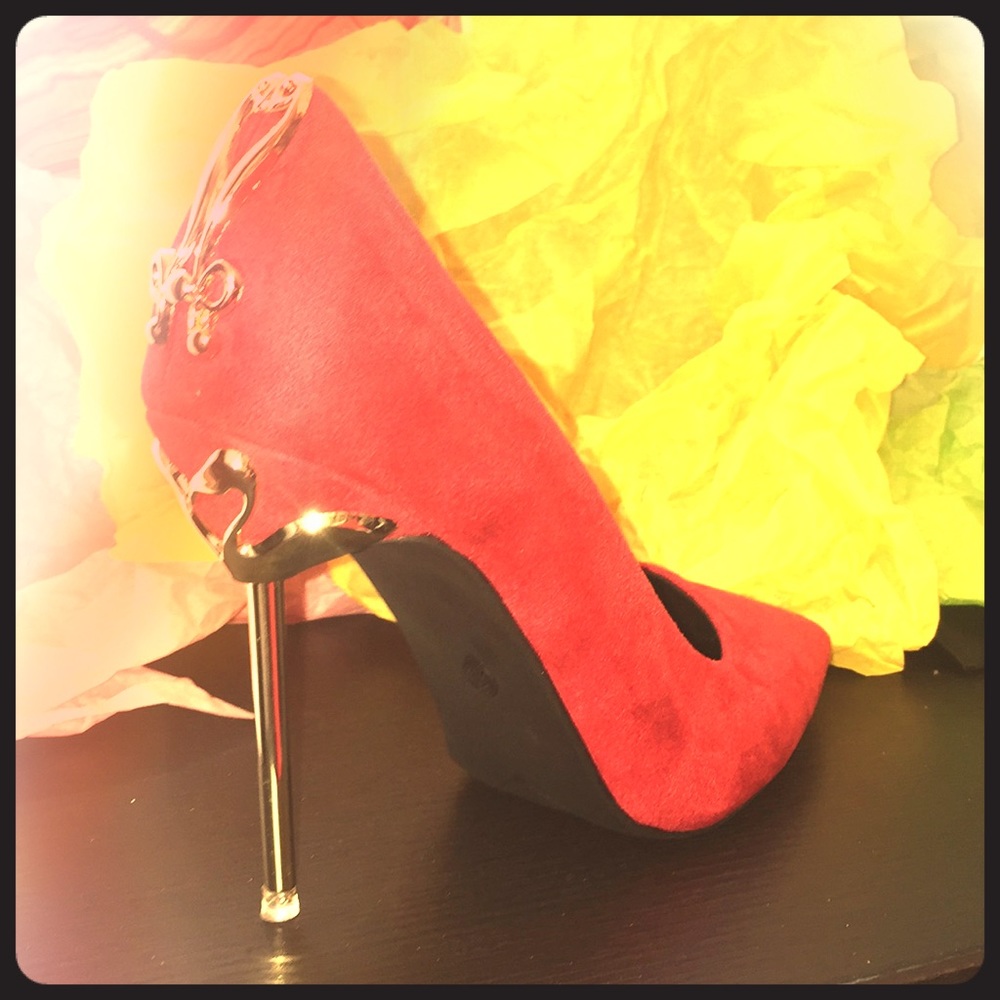 Red sued heels with gold back